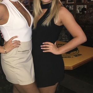 Black romper she and sky